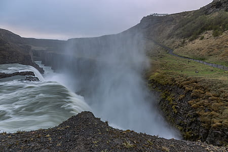 Close-up Photo of Waterfalls Under White Sky thumbnail