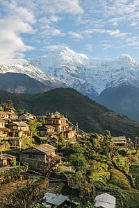 bird's eye view photo of village on mountain thumbnail