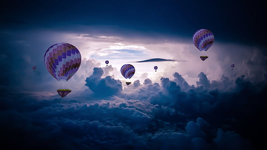 hot air balloons flying above clouds thumbnail