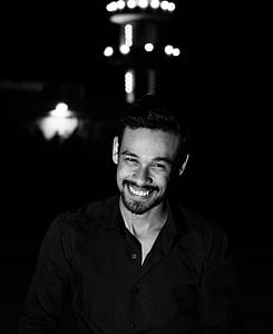 Man Wearing Black Button-up Shirt thumbnail