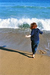 woman standing near seashore thumbnail