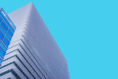 low angle photography of concrete building thumbnail