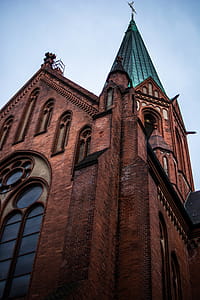 Low Angle Photography of Red and Green Cathedral thumbnail