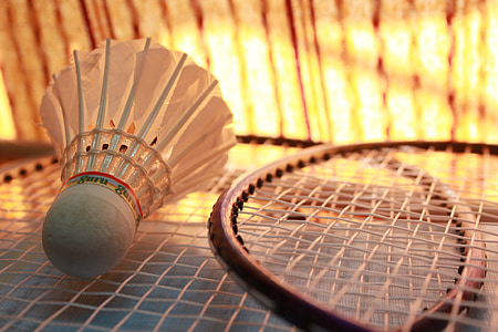badminton rackets and shuttlecock thumbnail