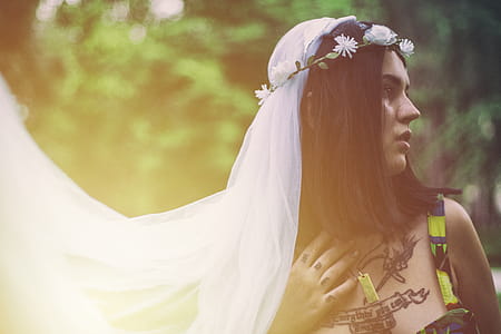 Woman Wearing White Veil Looking At Her Left Side thumbnail