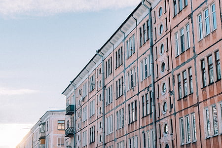 low angle photography of brown building thumbnail
