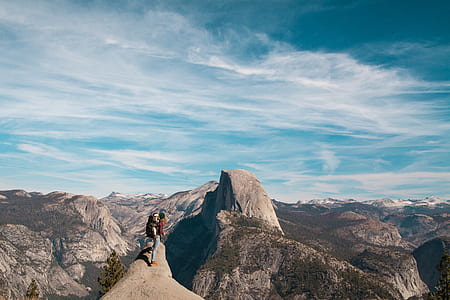 Woman With Baby At The Peak Of A Mountain thumbnail