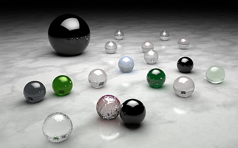 black, green, and grey balls thumbnail