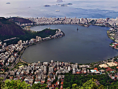 aerial photo of body of water surrounded by buildings thumbnail