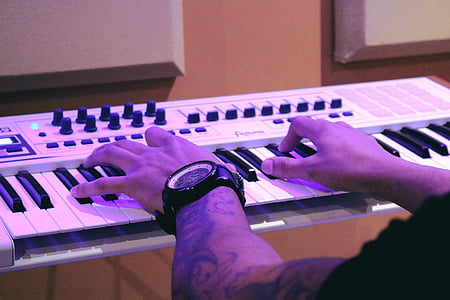 person playing electronic keyboard thumbnail