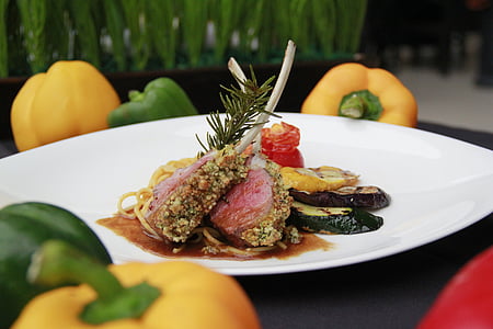 cooked meat with pasta on white plate thumbnail