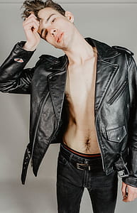 man wearing black leather jacket thumbnail