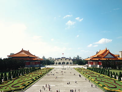 clear sky over orange and white building landmarks thumbnail