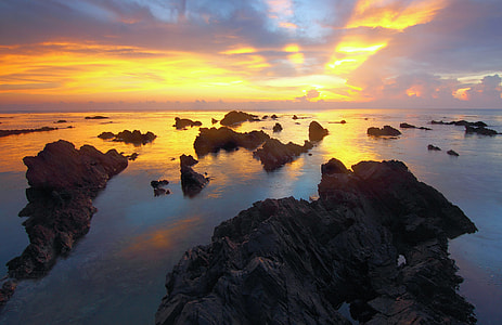 Sunset over the Ocean Rocks thumbnail
