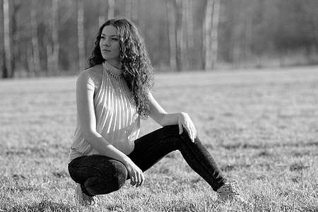 woman sitting on grass thumbnail