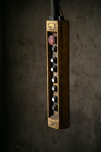 Yellow and Black Switch on Black Surface thumbnail