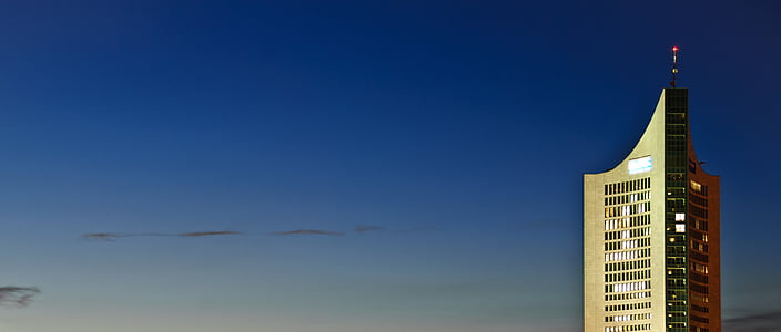 high rise building under clear sky thumbnail