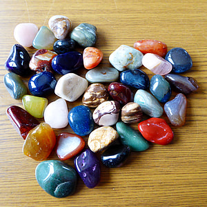 assorted-color polished stone lot on table thumbnail