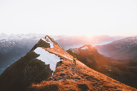 person standing on top of mountain thumbnail