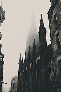 low angle photography of cathedral taken at foggy morning thumbnail
