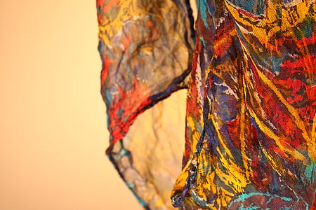 closeup photo of red, brown, and green cloth thumbnail