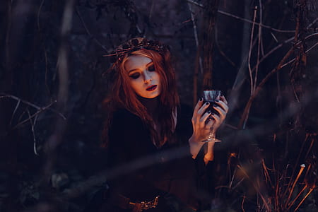 woman wearing black dress holding container thumbnail