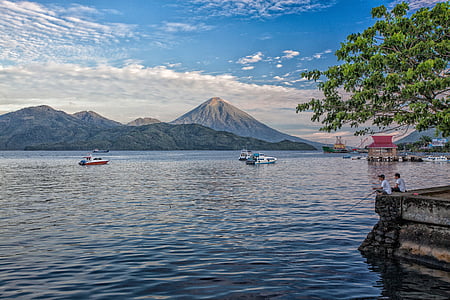 white and red speedboat in calm body of water thumbnail