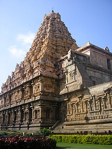 brown concrete temple under blue and white skies thumbnail