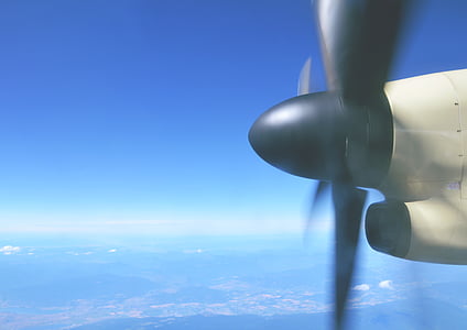 white and black airplane propeller above the sky thumbnail