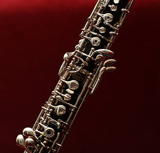 Gray Instrument on Red Textile thumbnail