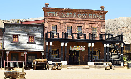 The Yellow Rose restaurant facade with barrels decor thumbnail