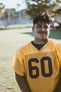 sports player smiling at daytime thumbnail