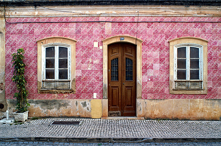 pink and beige concrete house thumbnail