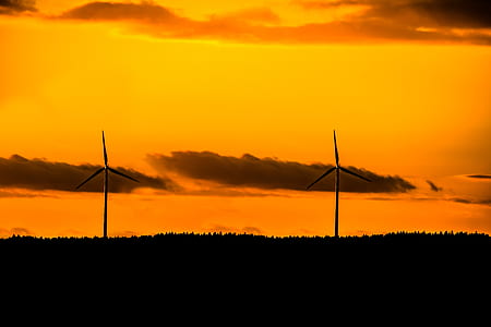 windmills photo during dawn thumbnail