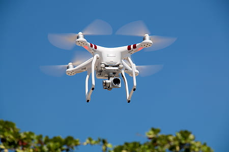 timelapse photography of white quadcopter thumbnail