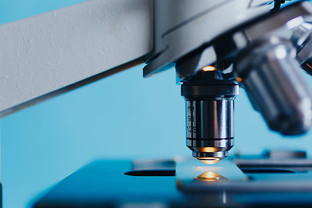 white and grey stainless steel 3-lens microscope thumbnail