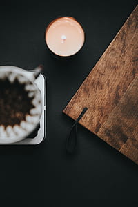 white tea light candle in flat lay photography thumbnail