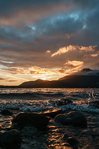 Sunset On Rocky Beach Photo thumbnail