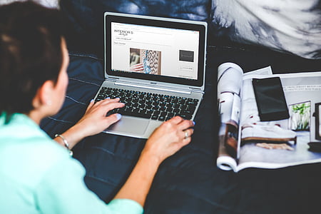 woman seating infront laptop thumbnail