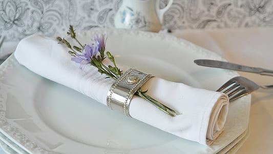 table napkin on plate with flowers thumbnail