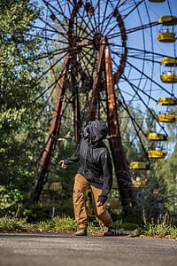 Person Standing Near Ferris Wheel thumbnail