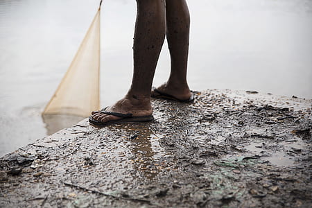 man standing on cliff thumbnail
