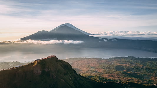 bird's-eye view photo of mountain with landscape field in distant thumbnail