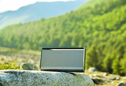 black and grey speaker on rock thumbnail