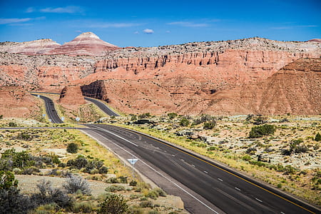 aerial photography of road near mountain thumbnail