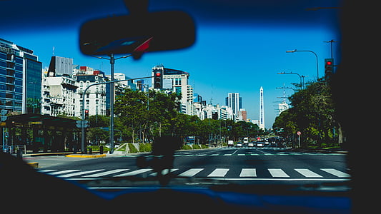 vehicles on road during daytime thumbnail