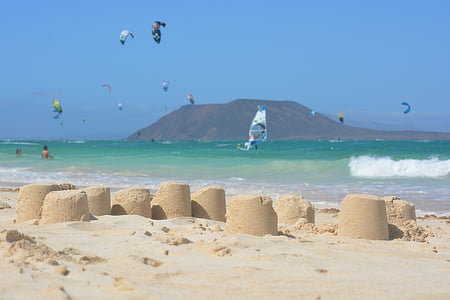 parachutes above body of water thumbnail