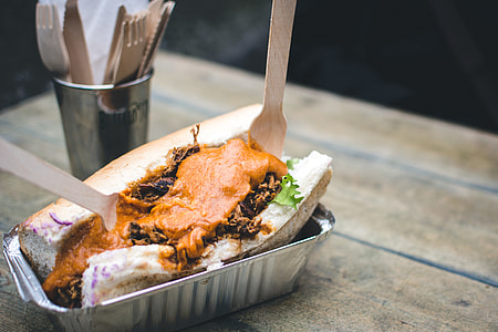 Pulled pork sandwich with cheese sauce thumbnail