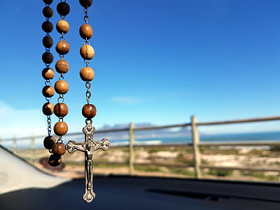 brown rosary selective focus photography thumbnail