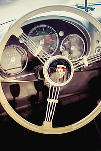 gray and black Porsche vehicle steering wheel thumbnail